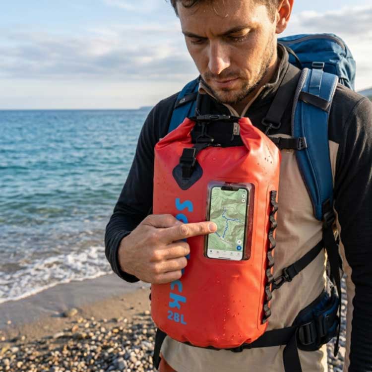 Hikers check map navigation through the phone viewing window of the Sealock waterproof backpack